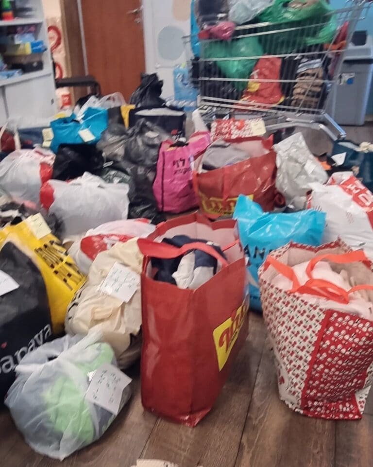 Bags of donations collected for evacuees after the Hamas attack on Israel.