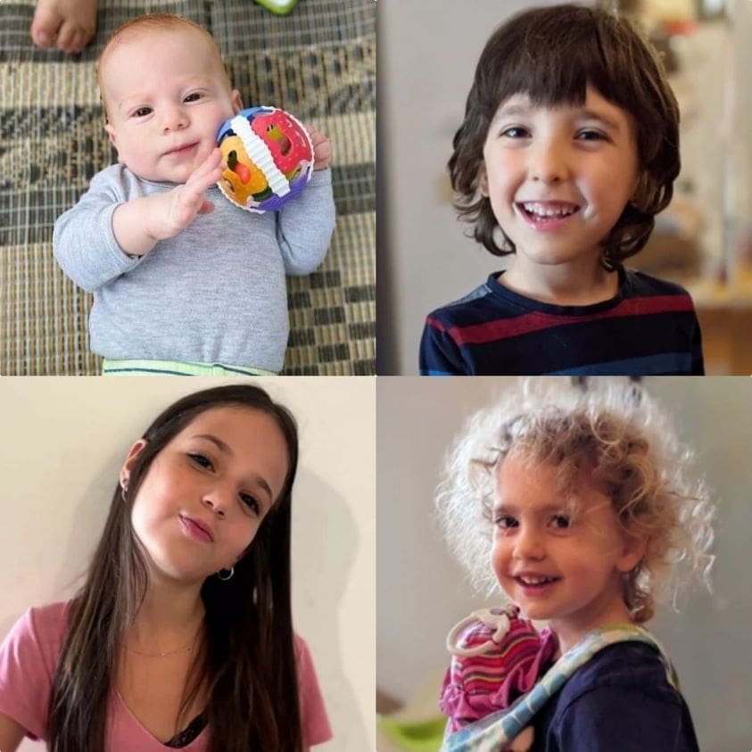 Four smiling childern who have been kidnnaped to gaza by Hamas.