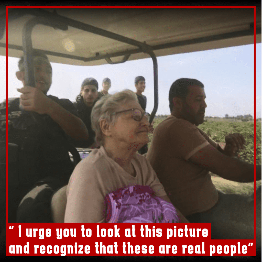 An elderly woman, Yaffa Adar, sits on a golf cart taken to Gaza by the Gazanian people who may belong to Hamas or just joined the attack.